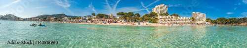 Fototapeta Naklejka Na Ścianę i Meble -  beautiful panorama of beach at paguera with clear water and hotels in the background