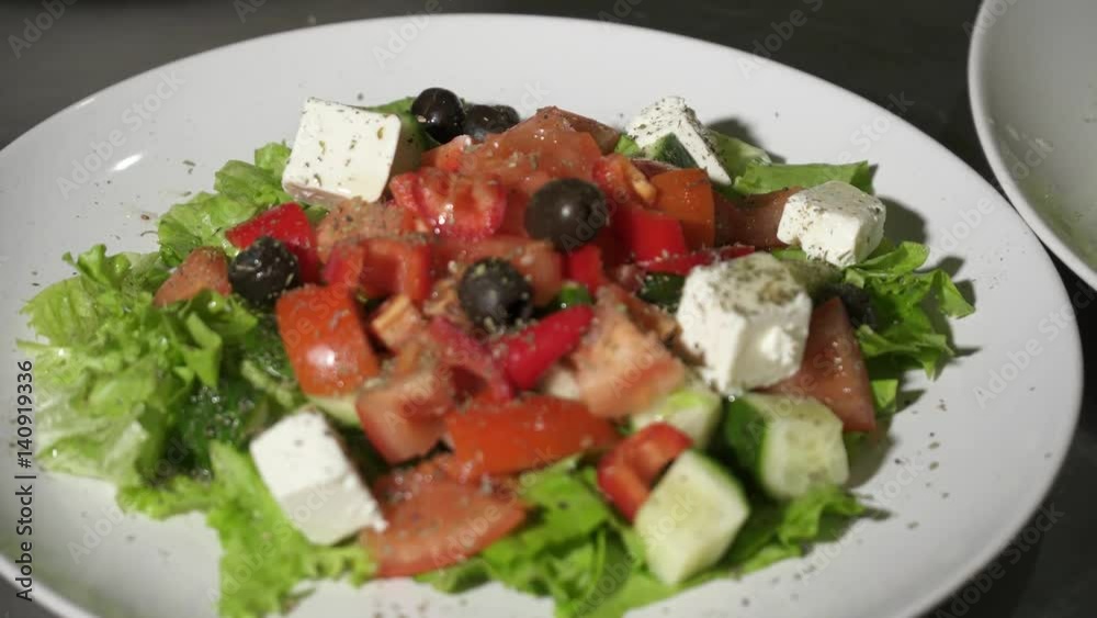 Closeup of greek salad on a white plates Closeup of greek salad on a white plates