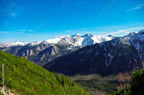 Autumn landscape of great peaks covered with snow. Tatry.