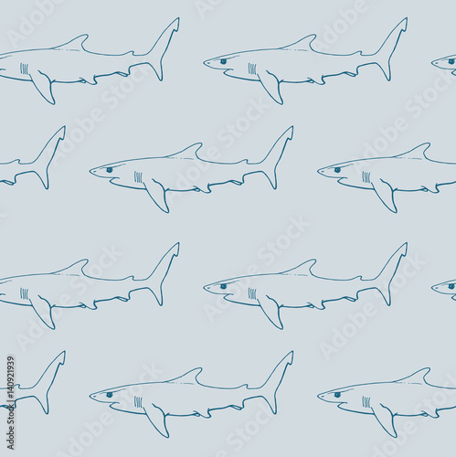 seamless pattern with blue shark on colored background