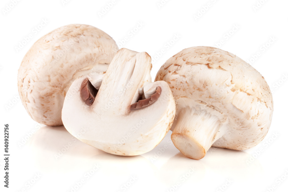 Fresh champignon mushrooms isolated on white background Fresh champignon mushrooms isolated on white background