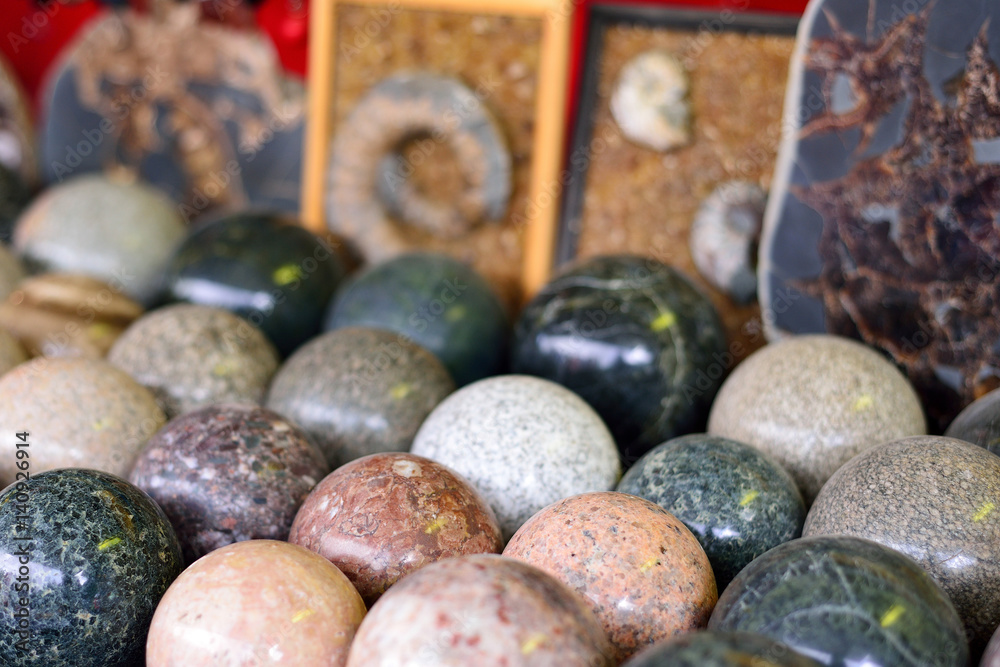 stone balls of different minerals, ammonites, tourist souvenir stone balls of different minerals, ammonites, tourist souvenir