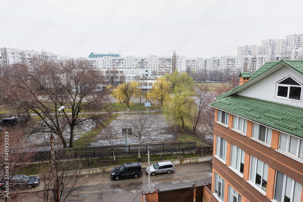 View on george meniuc school stadium and buildings in center of chisinau, moldova