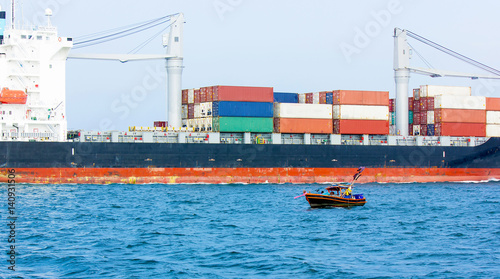 Cargo boat and small boat