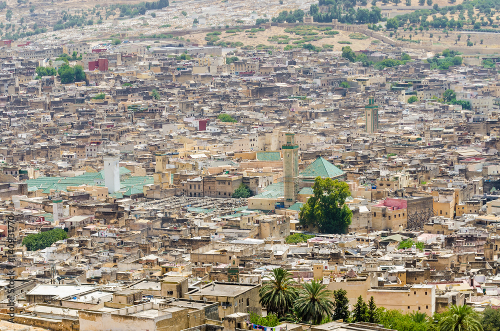 Aerial view of historical Moroccan Arabic town Fez with its city wall and soukhs