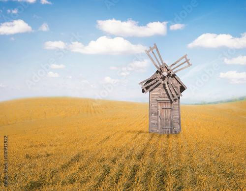 Windmill in field