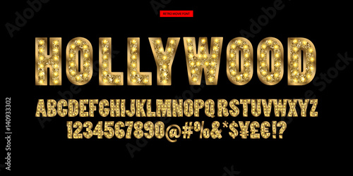 Fototapeta Hollywood. Color Golden alphabet with show lamps.