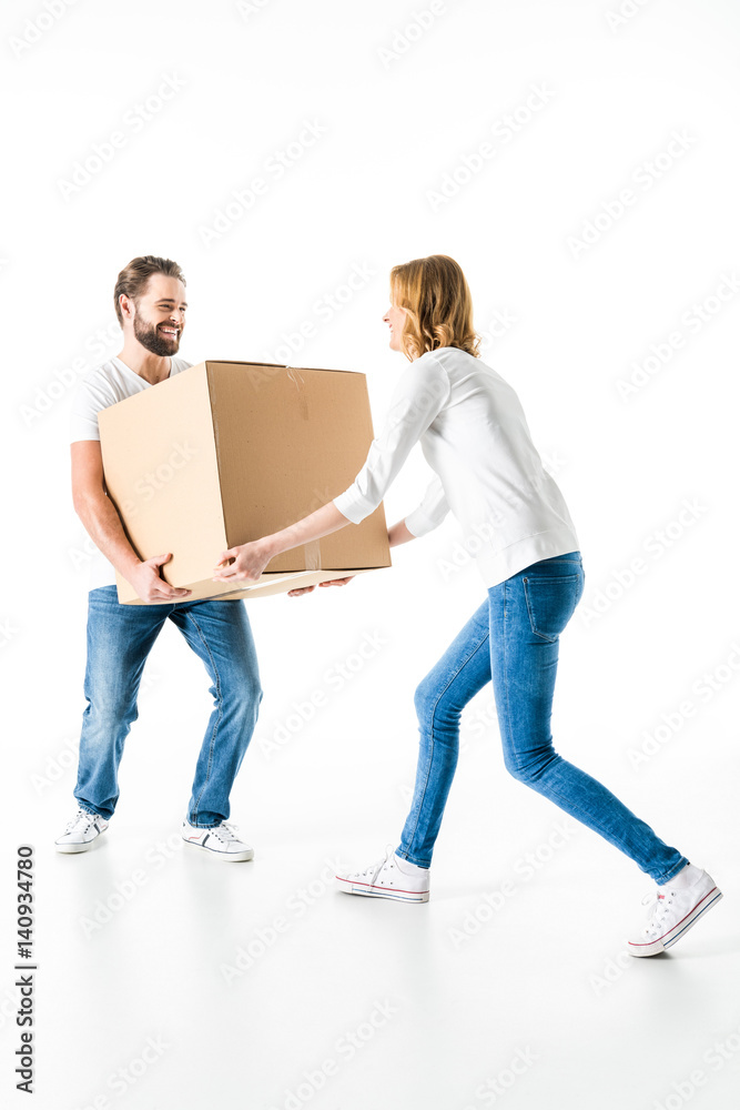 Couple with cardboard box Couple with cardboard box