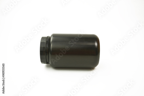 A black plastic bottle on the white background. No brand plastic empty bottle
