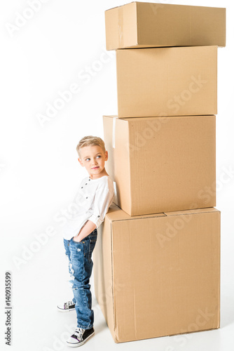 Boy with cardboard boxes