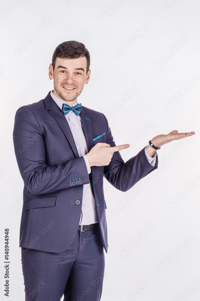 man presenting or showing something your text or product. human emotion expression and lifestyle concept. image on a white studio background. man presenting or showing something your text or product. human emotion expression and lifestyle concept. image on a white studio background.