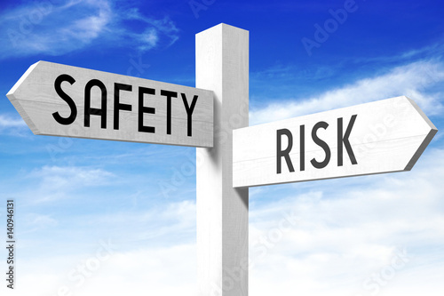 Risk, safety - wooden signpost