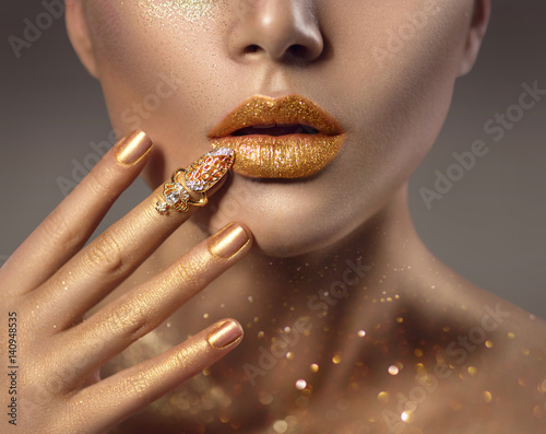 Fashion art golden skin woman face portrait closeup