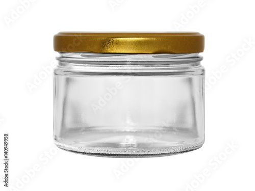 Empty glass jar with an iron lid isolated on white