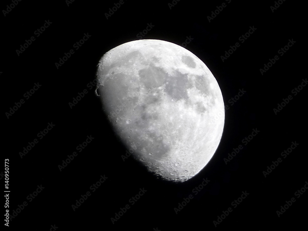 Incomplete moon in the sky over the Atlantic Ocean Incomplete moon in the sky over the Atlantic Ocean