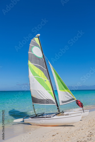 Sailing catamaran on the shore. Close-up