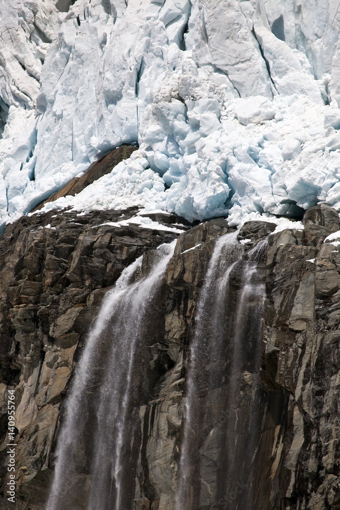 The water which comes from the glacier of Fellaria in Valmalenco creates a little waterfall. Lombardy Italy Europe The water which comes from the glacier of Fellaria in Valmalenco creates a little waterfall. Lombardy Italy Europe