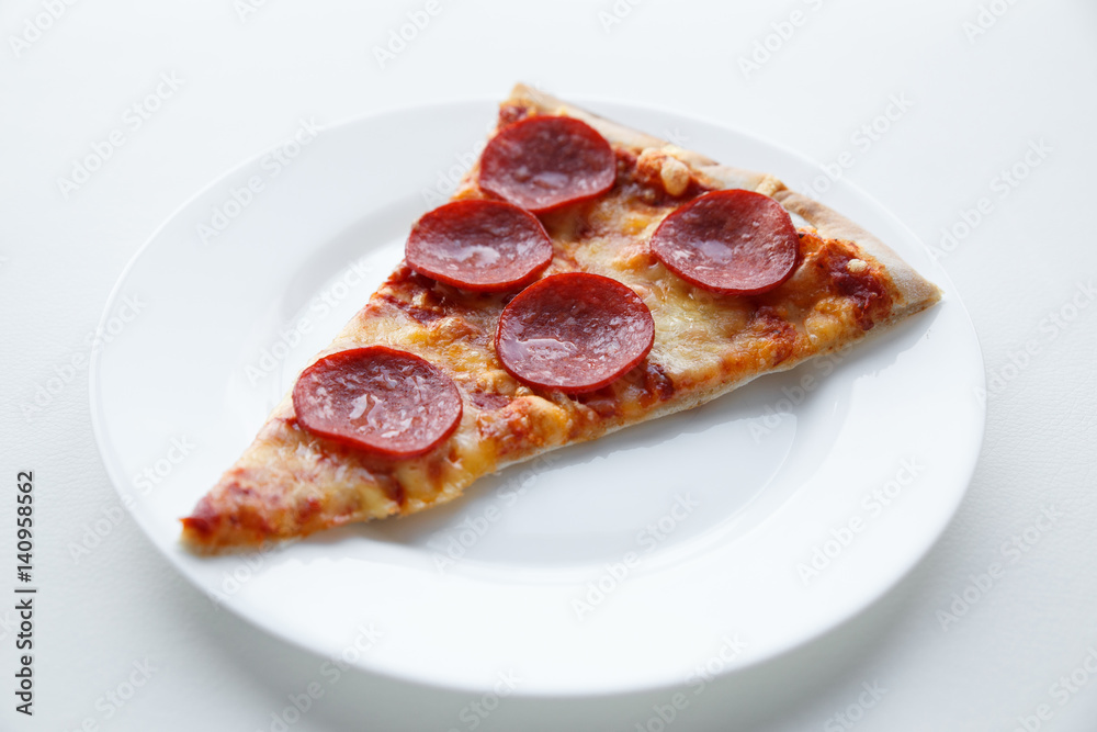 Pepperoni pizza. Hot homemade food. Slice of fresh italian classic salami pizza. Popular topping with cheese. Baked meal. Pepperoni pizza. Hot homemade food. Slice of fresh italian classic salami pizza. Popular topping with cheese. Baked meal.