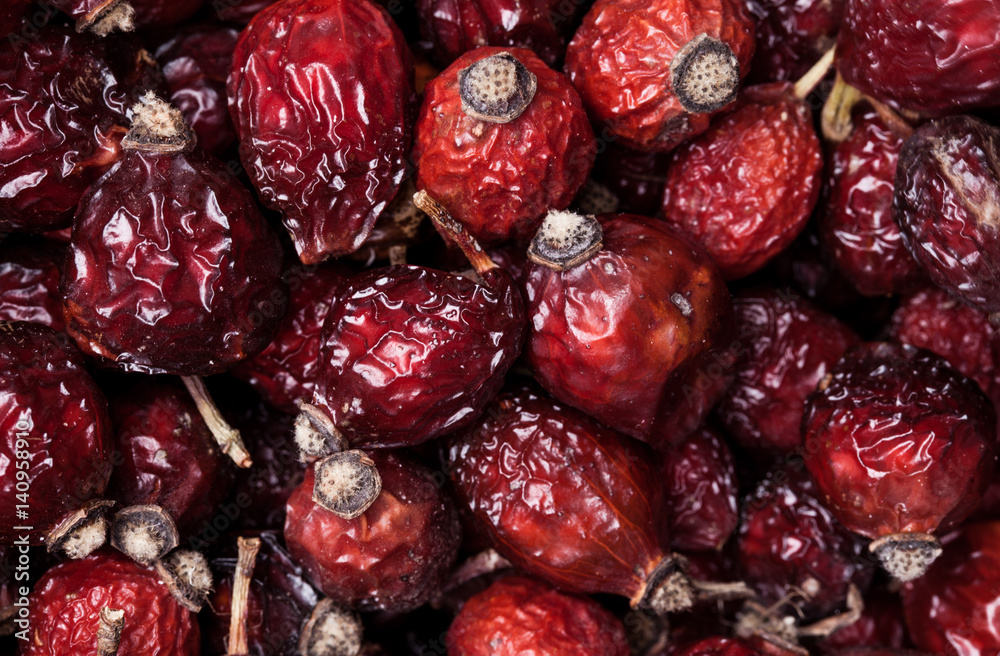 Close-up horizontal photo of dried berry dogrose (rose-hip) background. Healthy food and agriculture concept Close-up horizontal photo of dried berry dogrose (rose-hip) background. Healthy food and agriculture concept