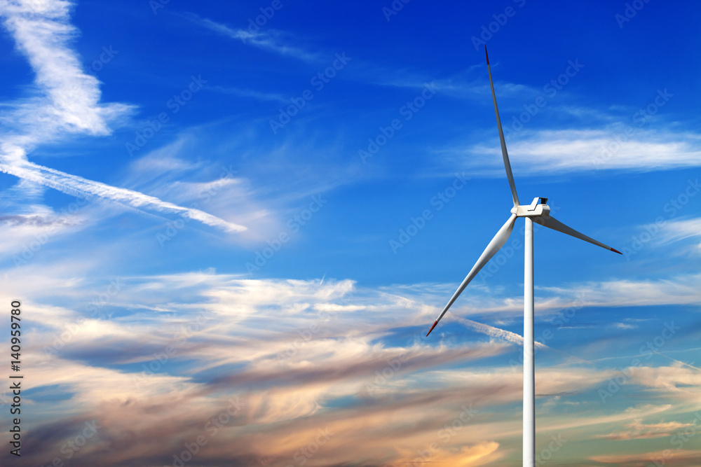 Fototapeta premium Wind turbine and multicolor sunrise sky