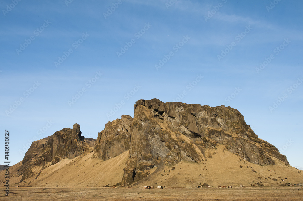 Mountains in sparse landscape, Iceland Mountains in sparse landscape, Iceland