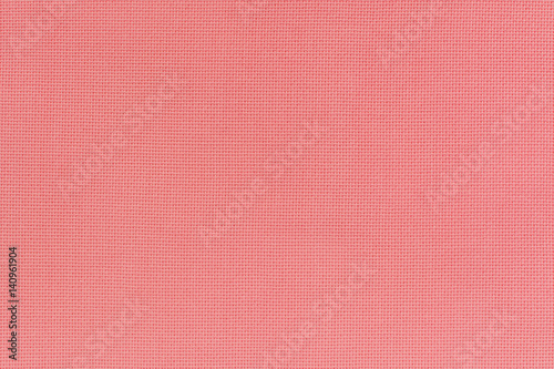 Texture of the rose color linen fabric. Close-up view for the background