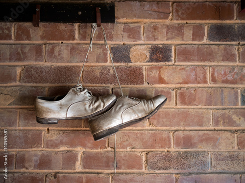No more cricket, old shoes hung up.