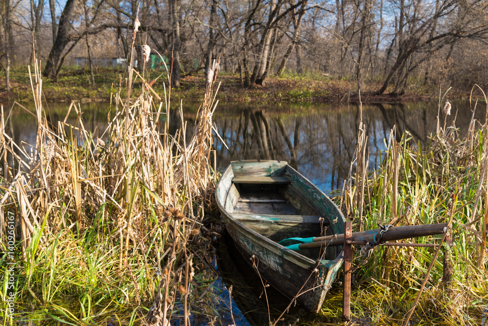 Old wooden boat with oars