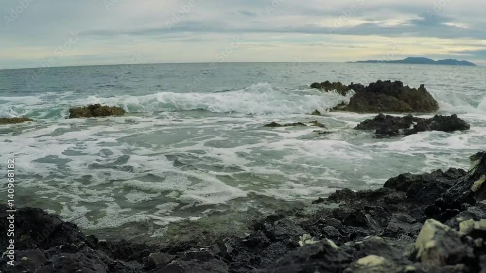 Beautiful sea crash into beach rocks. Slow motion. Beautiful sea crash into beach rocks. Slow motion.