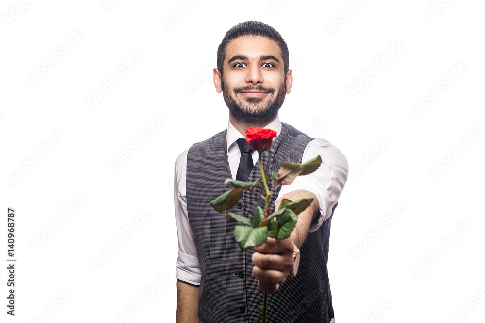 Handsome romantic happy man with rose flower. studio shot. isolated on white background. holding and giving flower and looking at camera and smiling.. Handsome romantic happy man with rose flower. studio shot. isolated on white background. holding and giving flower and looking at camera and smiling..