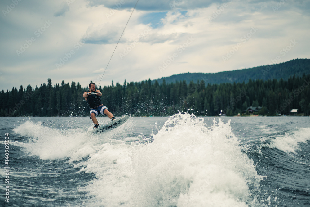 Naklejka premium Wakesurfing on a lake in summer - McCall, Idaho