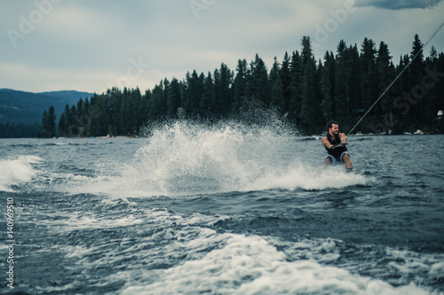 Wakesurfing on a lake in summer - McCall, Idaho © InfiniteSumLTD