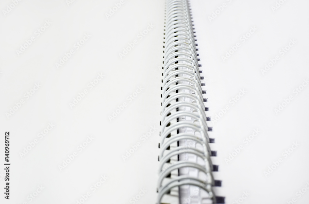 Spiral Bound Notebook with blank pages, dof background detail, selective focus Spiral Bound Notebook with blank pages, dof background detail, selective focus
