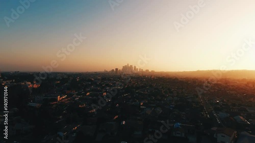 Aerial wide, Los Angeles cityscape at sunset