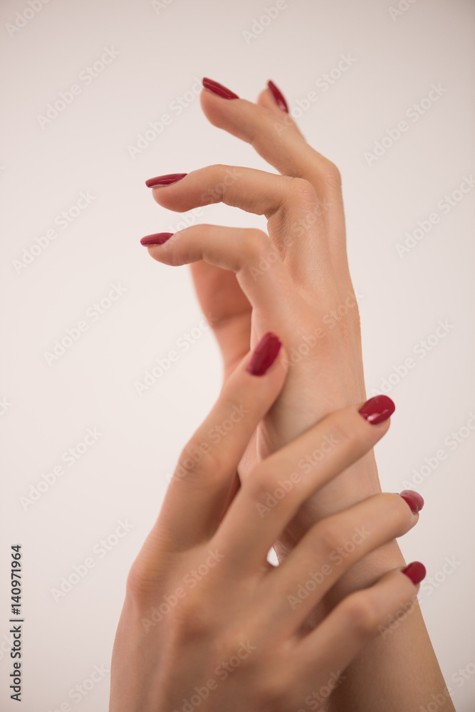 closeup of hands of a young woman closeup of hands of a young woman