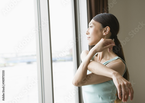 A woman stretching Free Download A woman stretching - GFXLoad