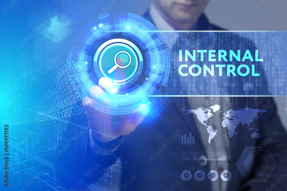 Business, Technology, Internet and network concept. Business man working on the tablet of the future, select on the virtual display: Internal control Business, Technology, Internet and network concept. Business man working on the tablet of the future, select on the virtual display: Internal control