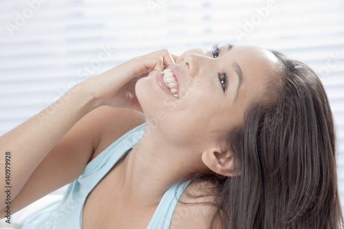 Young woman talking on a cell phone