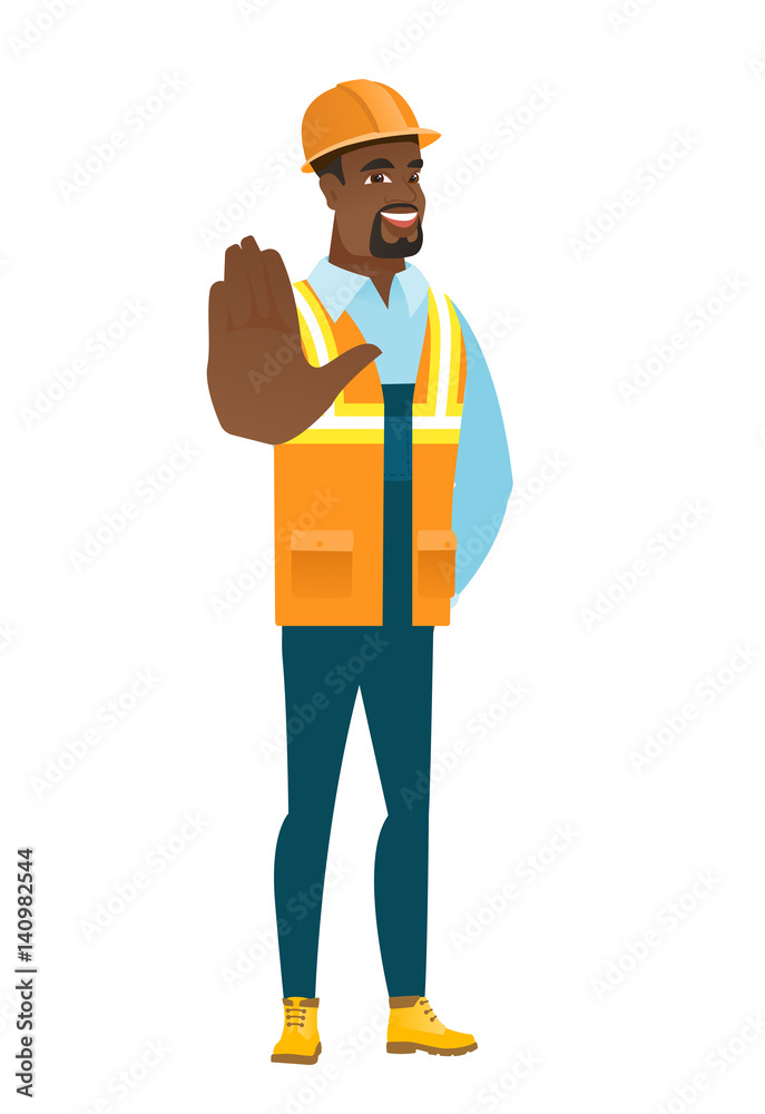 African-american builder showing palm hand. African-american builder showing palm hand.