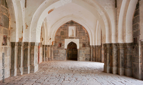 Leinwand Poster Archways of ancient stone church