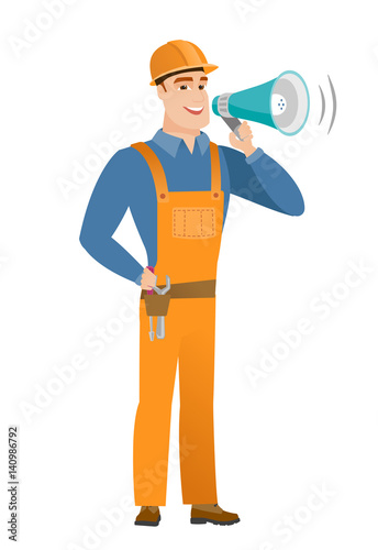 Caucasian builder talking into loudspeaker.