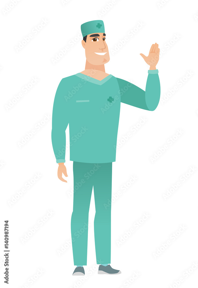 Young caucasian doctor waving his hand. Young caucasian doctor waving his hand.