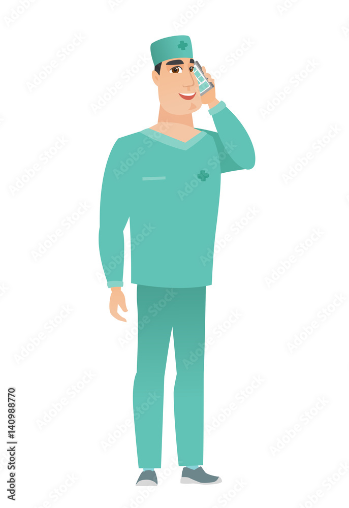 Doctor talking on a mobile phone.