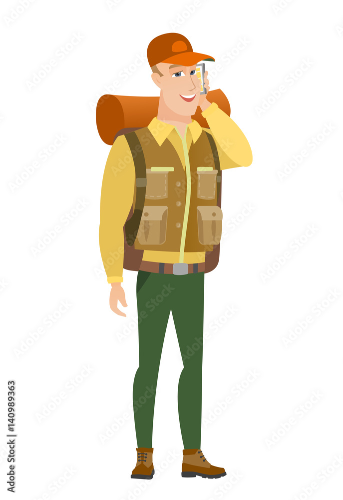 Traveler talking on a mobile phone. Traveler talking on a mobile phone.