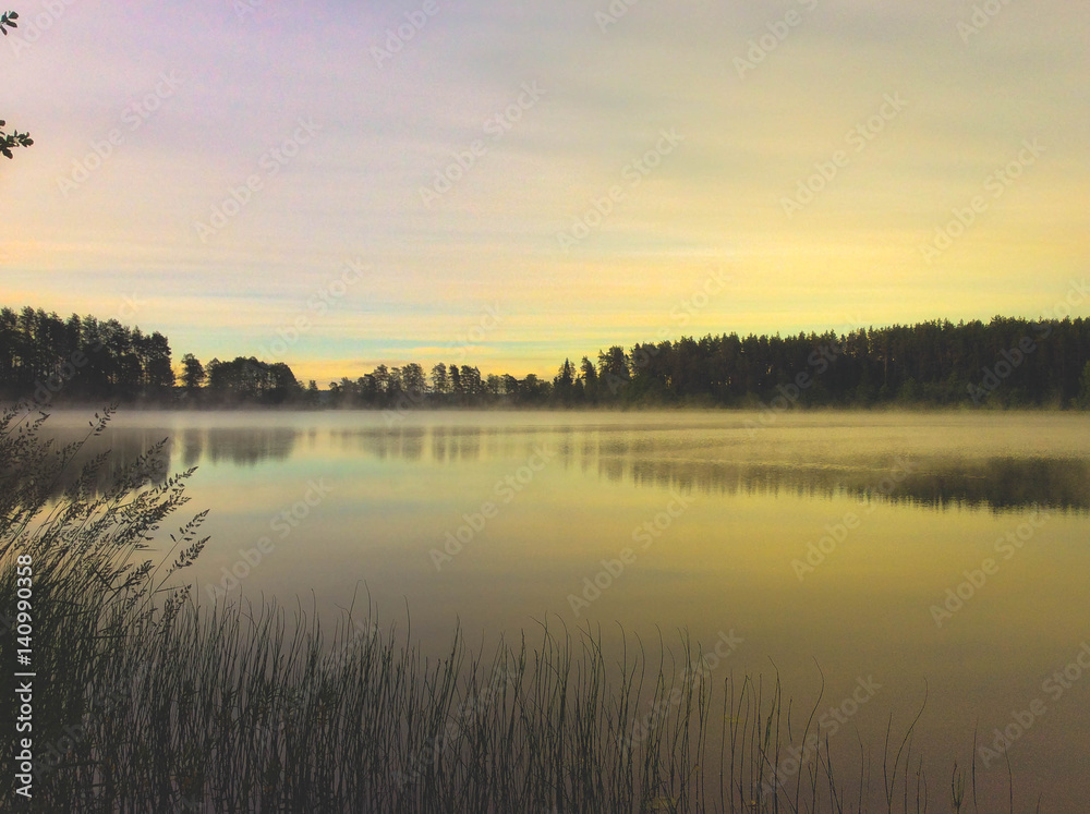Morning fog on the lake, sunrise shot