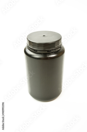 A black plastic bottle on the white background. No brand plastic empty bottle