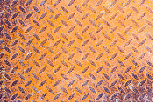 Surfaces metal floor sheet with rust.