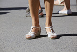 female legs in sandals
