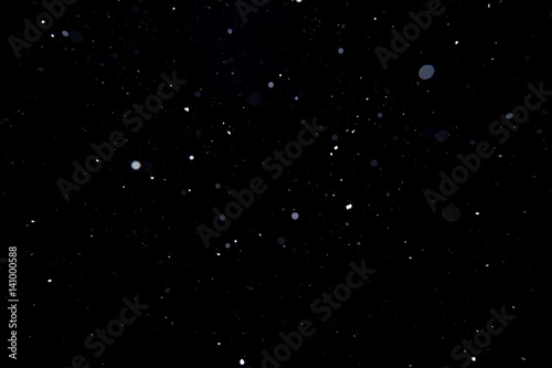snowflakes on a black background