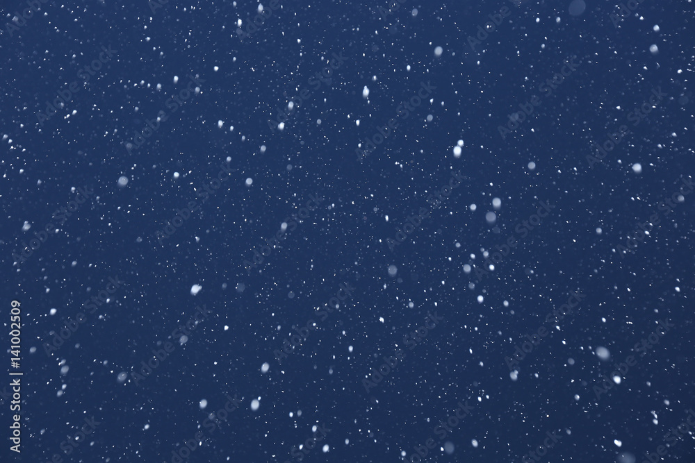snow on a black background snow on a black background